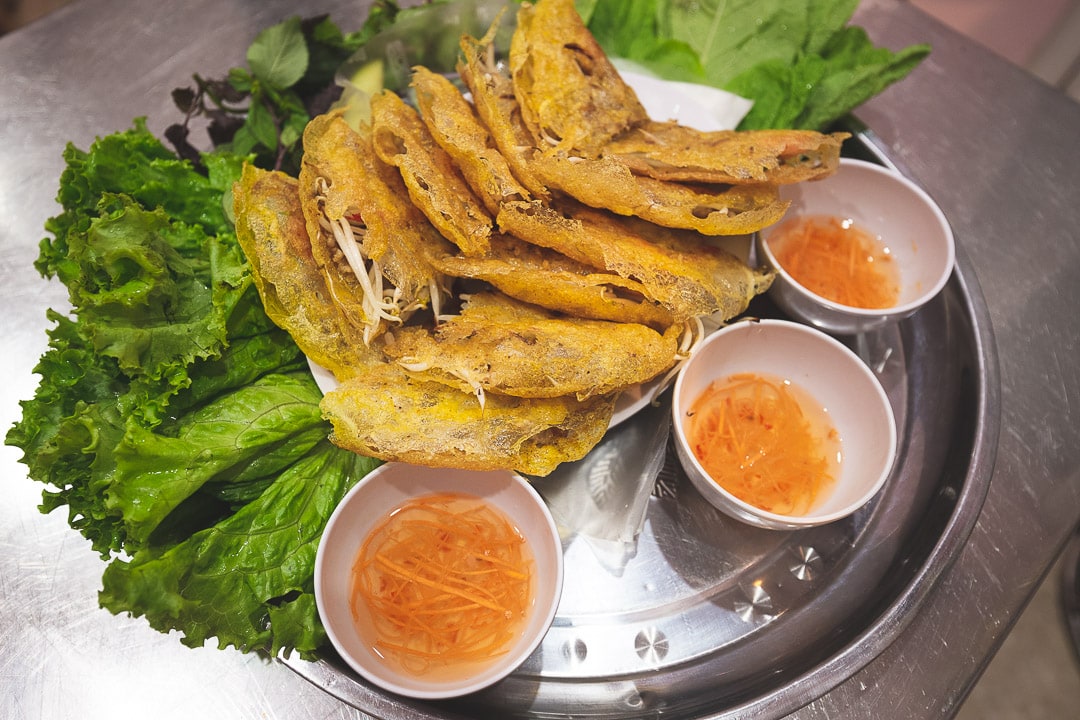 Banh xeo with dipping sauce in Hanoi, Vietnam