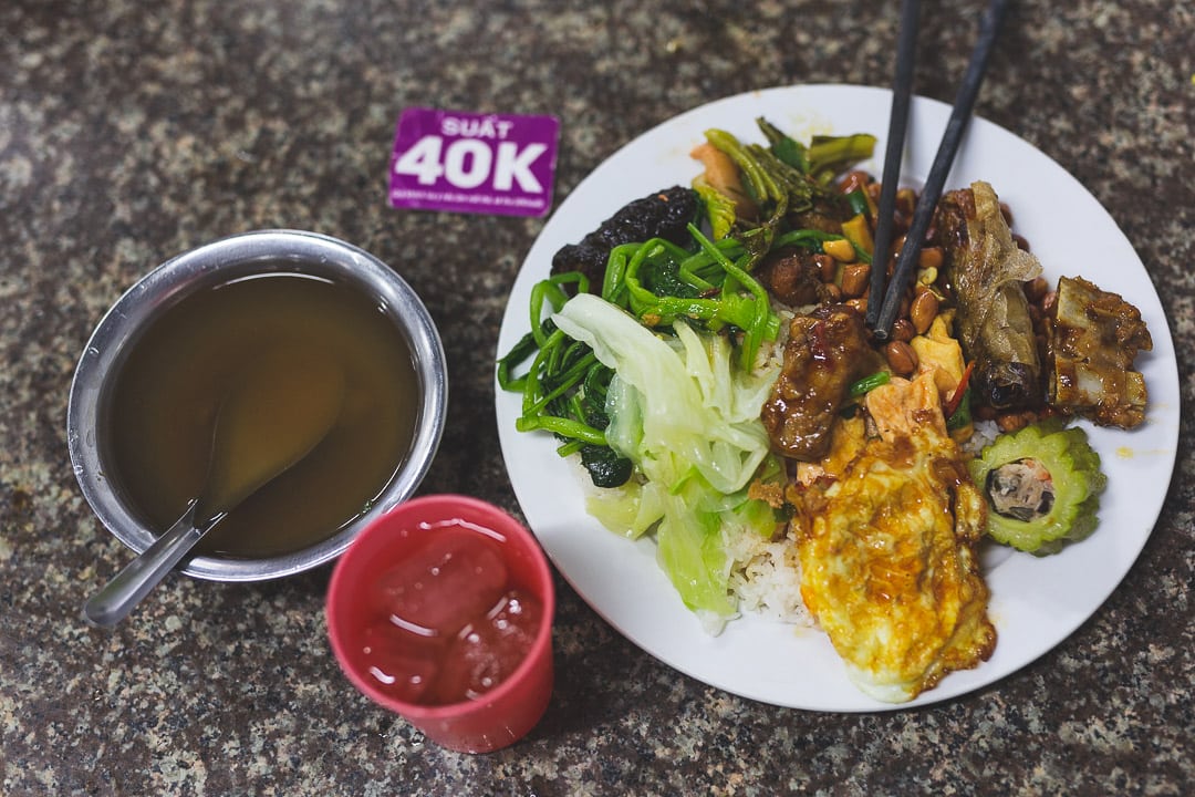 A plate of com binh dan or working class rice in Hanoi, Vietnam.